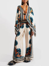 Pantalones anchos y holgados con estampado de plantas de satén exquisito